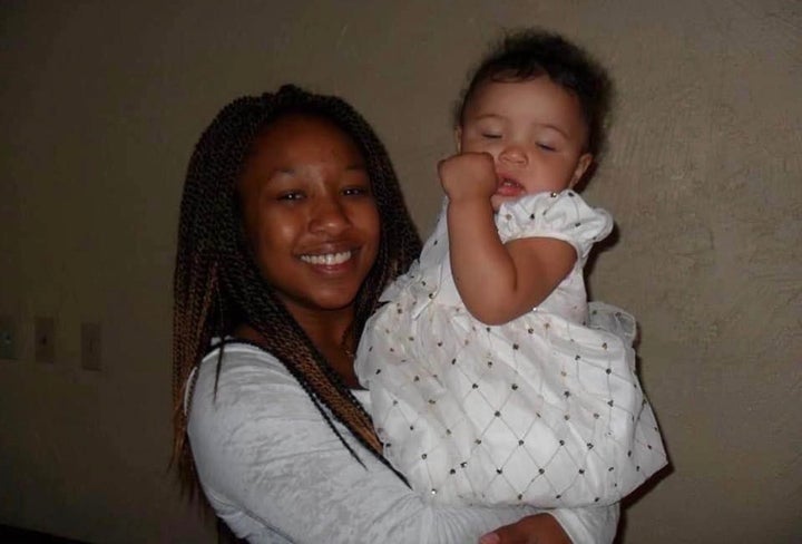 Crystal Davis holds her daughter Zion when she was a baby in an undated photo.