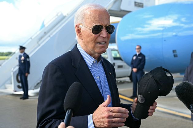 President Joe Biden speaks with the press Friday before boarding Air Force One in Madison, Wisconsin.