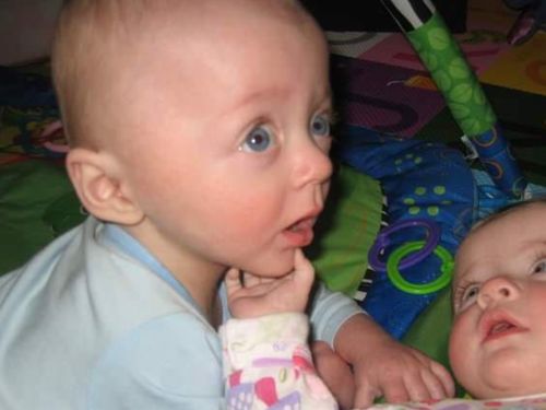 Barry (left) and Anne at three months (2010). "They were always reaching for each other," the author writes.