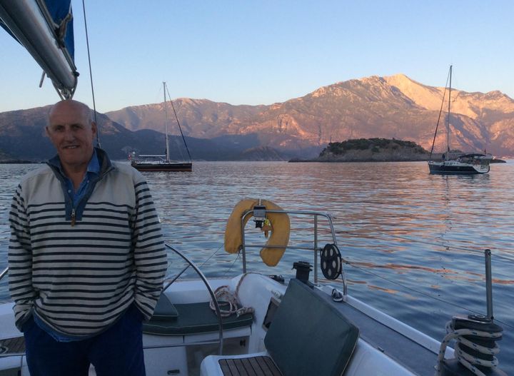 Simon on his beloved boat in his favorite place on the Turkish coast in 2019.