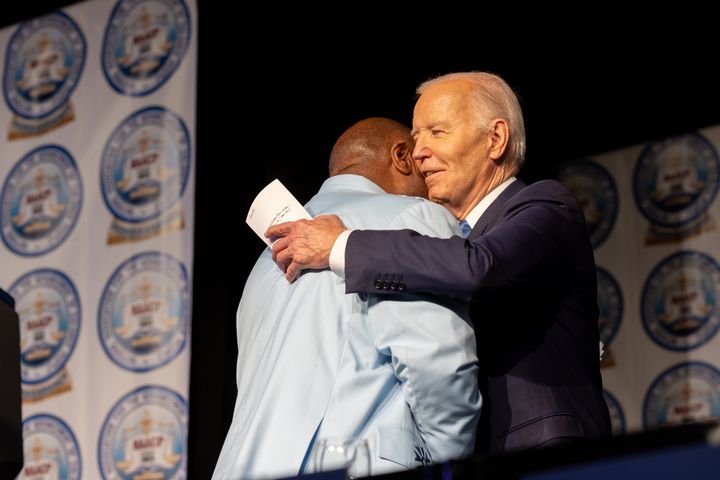 The Rev. Wendell Anthony, the president of the Detroit Branch NAACP, and U.S. President Joe Biden embrace during the Fight for Freedom Fund Dinner on May 19, 2024, in Detroit, Michigan.