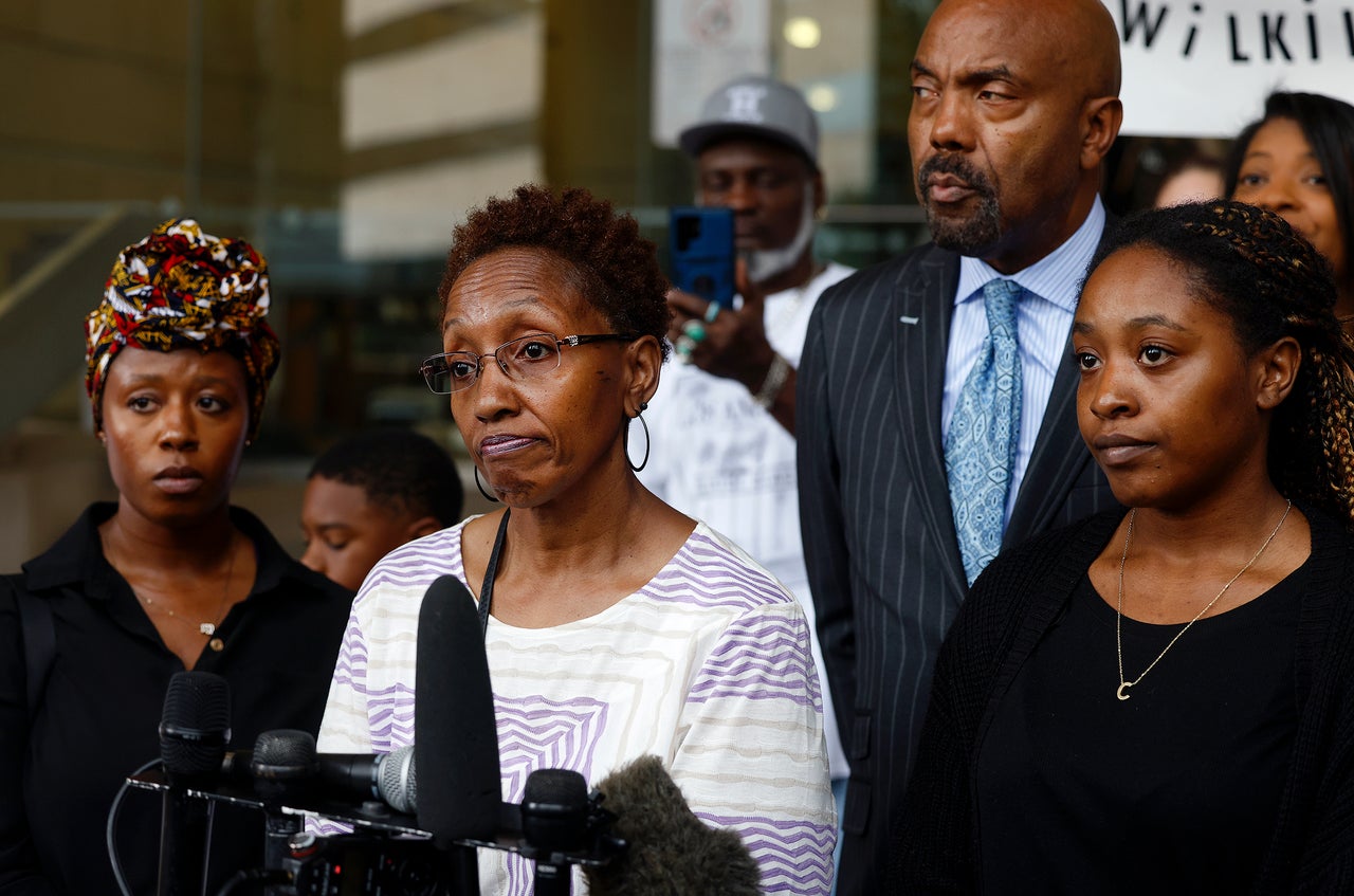 Jacqualyne Johnson (center), mother of Anthony Johnson Jr., is flanked by daughters Janell and Chanell at a June 11 news conference outside the Tim Curry Criminal Justice Center in Fort Worth, Texas. The medical examiner in Tarrant County ruled that Anthony Johnson Jr.'s death was a homicide, citing asphyxia from use of force and pepper spray as the cause of death.