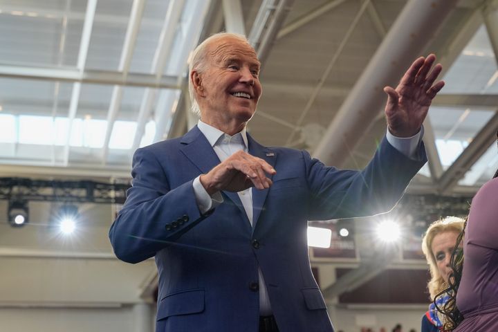 President Joe Biden waves after speaking to supporters at a campaign event at Renaissance High School, Friday, July 12, 2024. (AP Photo/Jacquelyn Martin)