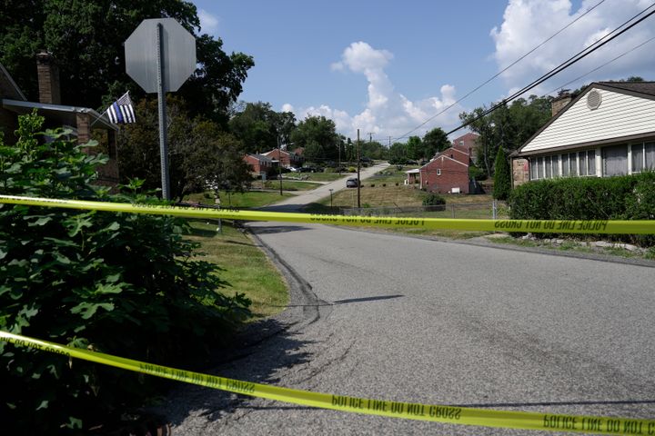 Police tape blocks a street in Bethel Park, Pennsylvania. Explosive materials were reportedly found in Crooks' vehicle and residence.