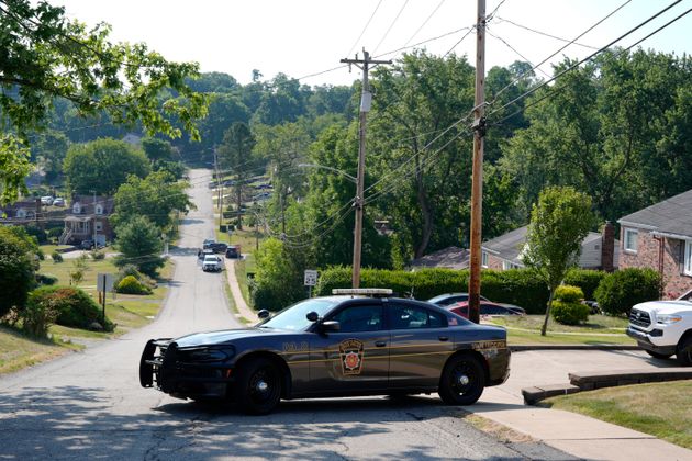 Law enforcement on July 14 block a street in Bethel Park, Pennsylvania, that they say is near the residence of the late Thomas Crooks, whom authorities identified as the man who attempted to assassinate Trump.