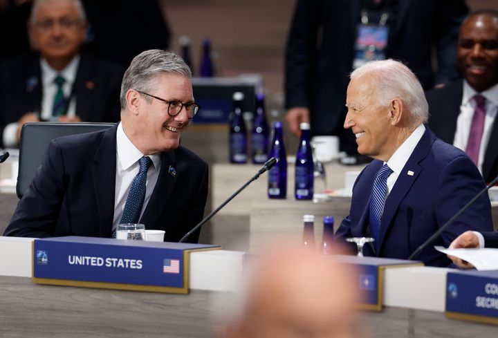 WASHINGTON, DC - JULY 10: UK Prime Minister Keir Starmer (L) and U.S. President Joe Biden talk during a meeting of the heads of state of the North Atlantic Council at the 2024 NATO Summit on July 10, 2024 in Washington, DC. NATO leaders convene in Washington this week for its annual summit to discuss future strategies and commitments and mark the 75th anniversary of the allianceâs founding. (Photo by Kevin Dietsch/Getty Images)