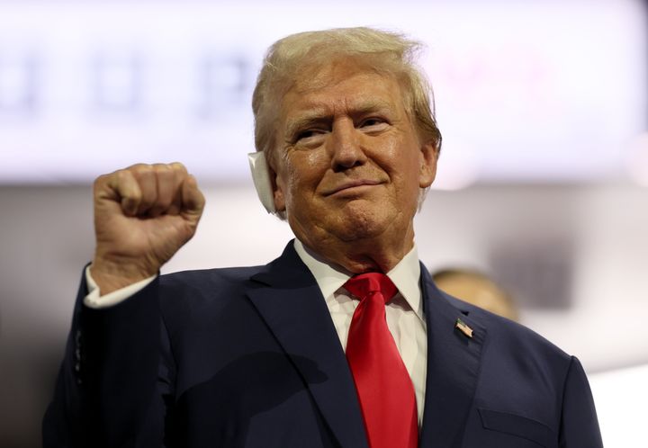 Former President Donald Trump gestures during the first day of the Republican National Convention in Milwaukee on Monday.