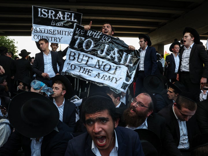 Ultra-Orthodox Jewish men protest against the new army draft on July 16, 2024 in Bnei Brak, Israel. Last month, the country's Supreme Court ended a government policy exempting ultra-Orthodox men from military conscription. 