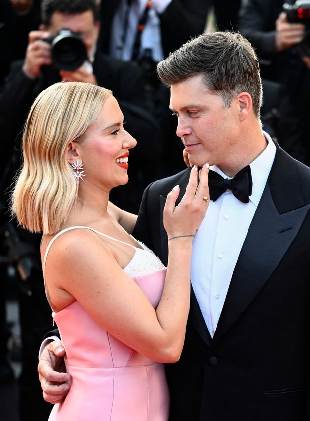 Colin Jost and Scarlett Johansson attend the Asteroid City red carpet during the 76th annual Cannes film festival in 2023.
