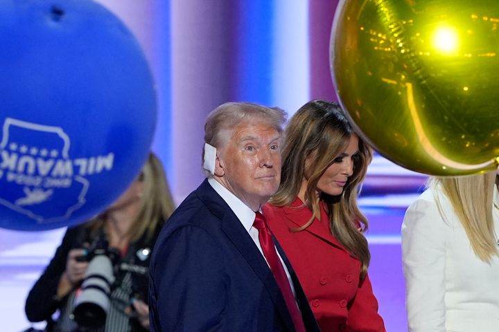 From l-r., Republican presidential candidate former President Donald Trump, walking on stage with former first lady Melania Trump at the end of the Republican National Convention, Thursday, July 18, 2024, in Milwaukee. (AP Photo/J. Scott Applewhite)