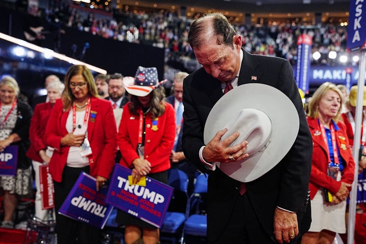 Republicans Suppose They Know What Saved Donald Trump 1 Convention attendees pray at Fiserv Forum on Sunday, July 15, 2024, at the RNC in Milwaukee, Wisconsin.