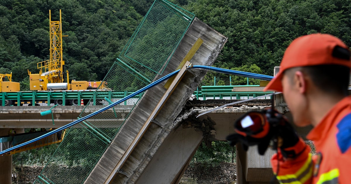 At Least 11 Dead, Dozens Missing After Highway Bridge In China Crumbles In Flood At Least 11 Dead, Dozens Missing After Highway Bridge In China Crumbles In Flood
