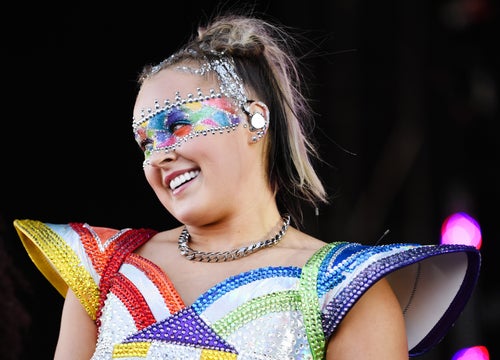 Siwa performs at 2024 LA Pride in June. The one-time Nickelodeon star recently told Cosmopolitan how she plans to have three babies with three surrogates.