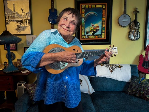 D'yan Forest, 89, who holds the Guinness World Record for Oldest Working Female Comedian, poses in her apartment on July 19 in New York. Forest is recovering after being randomly punched and knocked to the ground while waiting to cross a street in New York earlier this month.