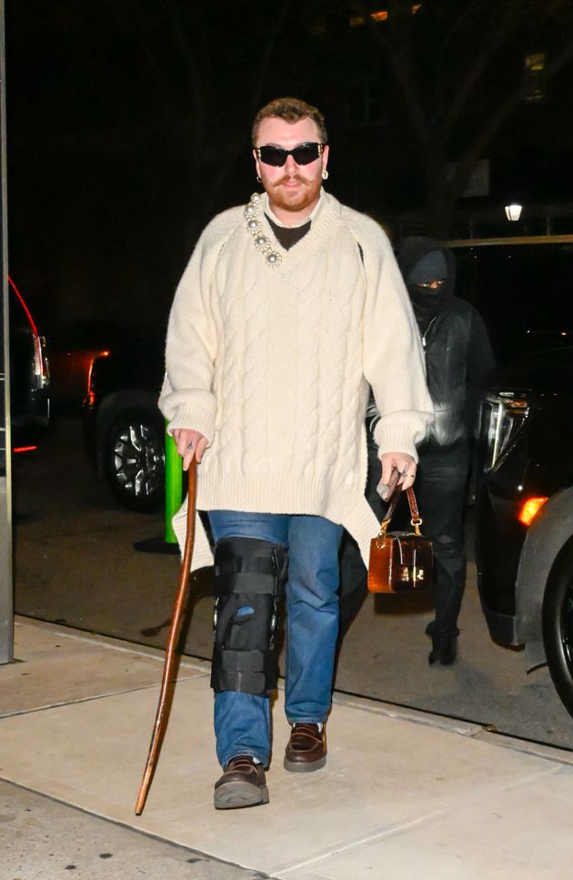 Sam was pictured walking with the aid of a cane back in January