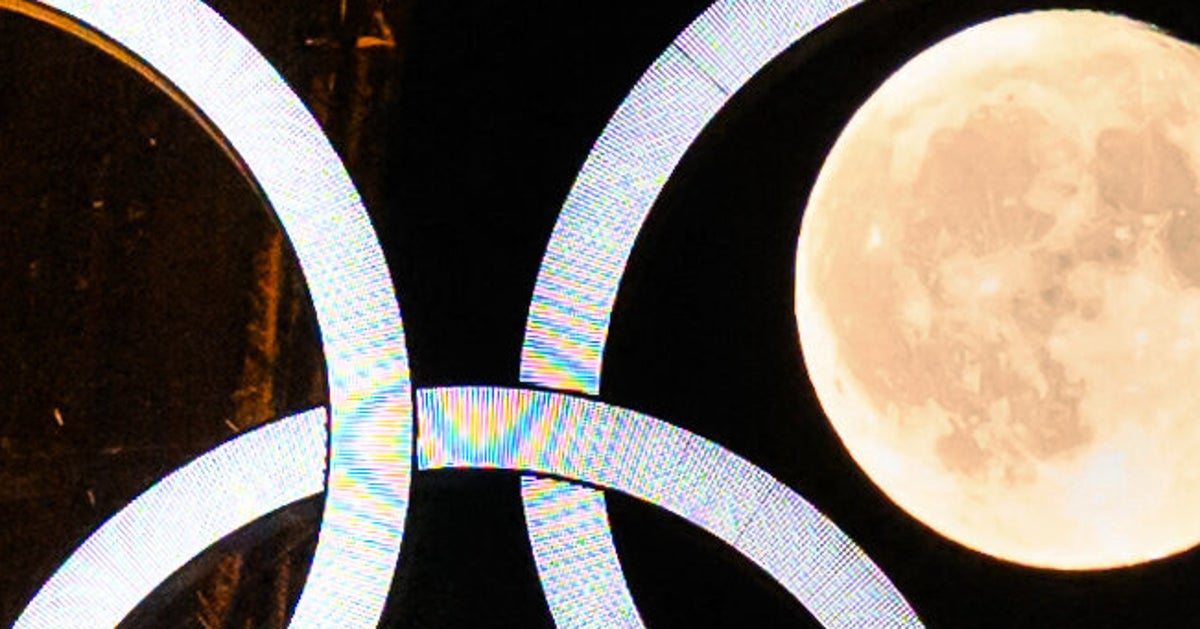 NextImg:Eiffel Tower And Moon Put On Olympically Spectacular Display Ahead Of Games