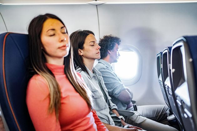 Let's Settle This – Who Gets To Use The Aeroplane Armrests?