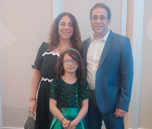 The author with her husband and daughter.