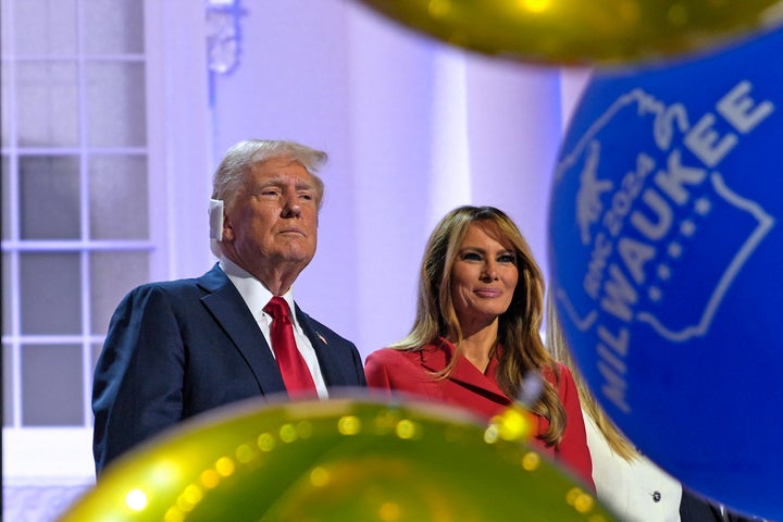 Former President Donald Trump is joined by former first lady Melania Trump after accepting his party's nomination at the 2024 Republican National Convention at the Fiserv Forum in Milwaukee, Wisconsin, on July 18, 2024. (Photo by Nick Oxford / AFP) (Photo by NICK OXFORD/AFP via Getty Images)