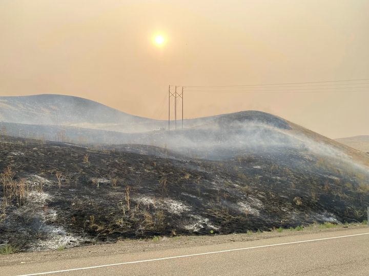 This image provided by the Oregon Department of Transportation, shows an area burned by the Durkee fire near Interstate 84 close to Huntington, Ore., on July 23, 2024.