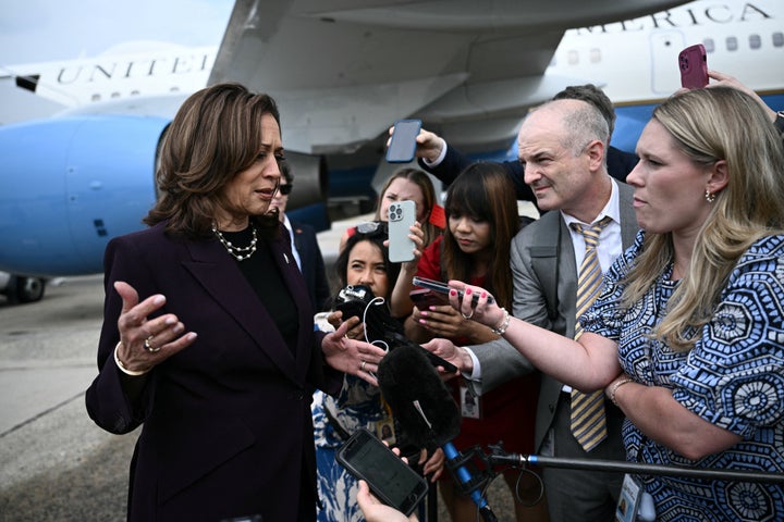 Kamala Harris speaks to reporters at Joint Base Andrews in Maryland.