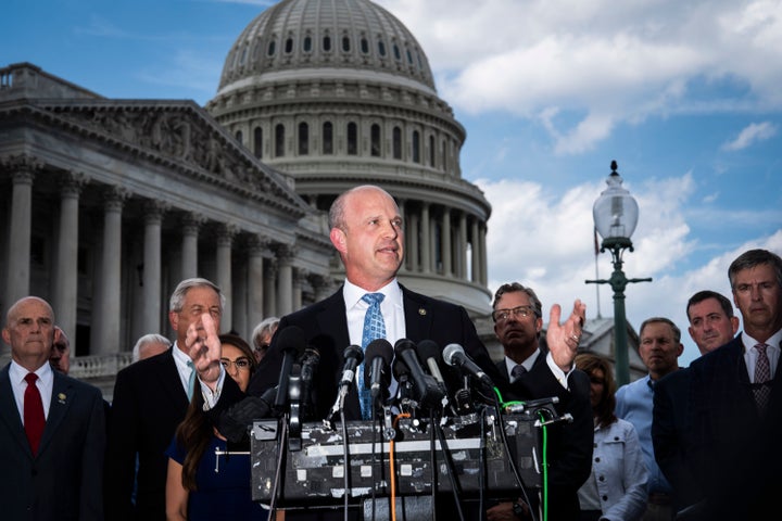 Kevin Roberts, president of The Heritage Foundation, speaks with members of the conservative House Freedom Caucus during a news conference on Capitol Hill on Tuesday, Sept 12, 2023.