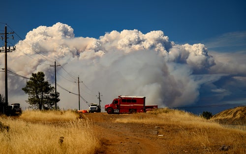 Smoke rises over the Forest Ranch area of Butte County as the Park Fire continues to burn near Chico, California, on July 26, 2024.