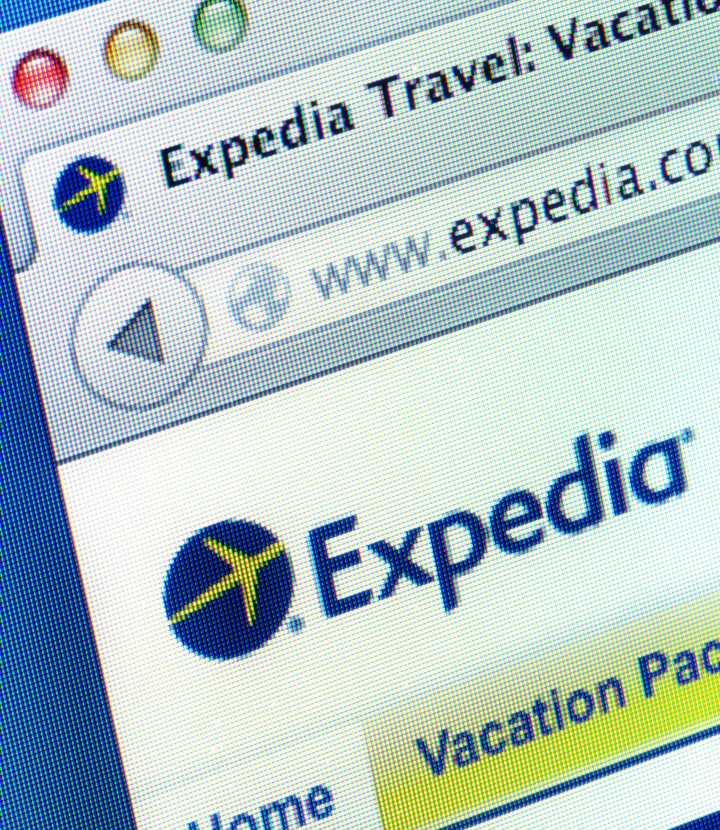 "Colorado Springs, USA - January 28, 2013: Close up of Expedia travel webpage on web browser. Expedia is an American travel reservation website."