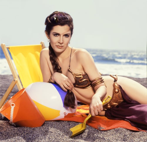 Carrie Fisher dons her bikini from "Return of the Jedi" in a 1983 photoshoot for Rolling Stone. The costume fetched a staggering $175,000 at auction on Friday.