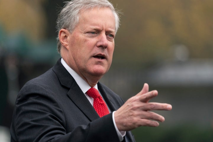 Mark Meadows speaks with reporters at the White House, Oct. 21, 2020, in Washington.