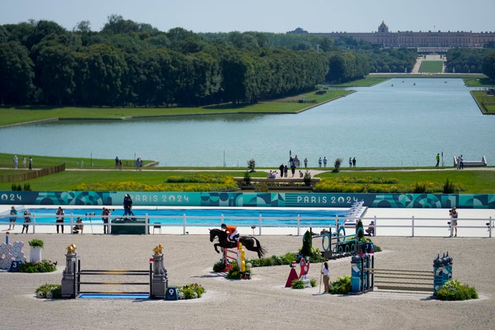 Equestrian jumping on the grounds of the Versailles Palace.