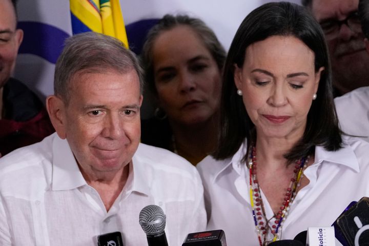 Opposition leader Maria Corina Machado, right, and presidential candidate Edmundo Gonzalez hold a press conference after electoral authorities declared President Nicolas Maduro the winner of the presidential election in Caracas, Venezuela, Monday, July 29, 2024. (AP Photo/Matias Delacroix)