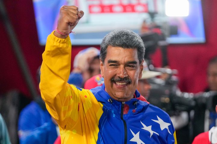 President Nicolas Maduro addresses supporters after electoral authorities declared him the winner of the presidential election in Caracas, Venezuela, Monday, July 29, 2024. (AP Photo/Fernando Vergara)