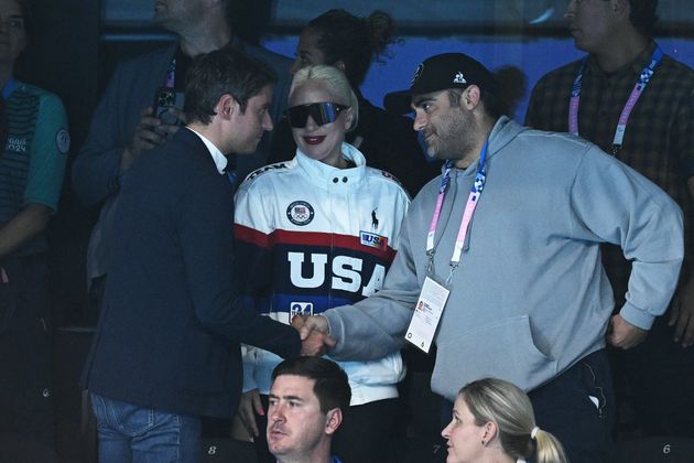 Lady Gaga introduces France's Prime Minister Gabriel Attal to a man who looks a lot like Michael Polansky during the swimming event at the Paris 2024 Olympic Games on Sunday.
