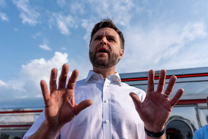 Republican vice presidential candidate Sen. JD Vance, R-Ohio, speaks with reporters outside the Park Diner, Sunday, July 28, 2024, in Waite Park, Minn. 