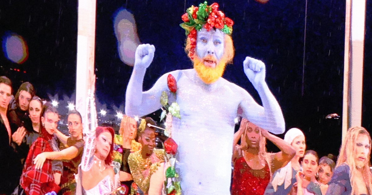 NextImg:'Semi-Naked Blue Guy' Reveals What Controversial Olympic Performance Was Really About