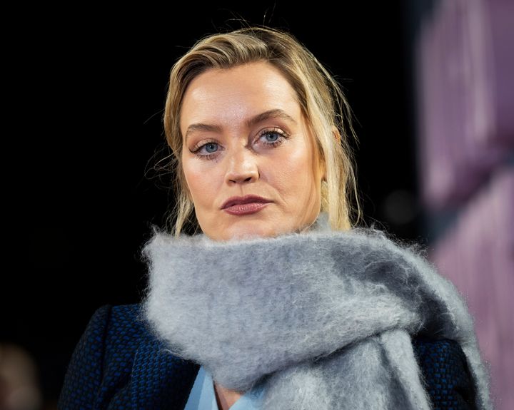 Laura Whitmore poses for photographers upon arrival at the premiere of the film 'All of us Strangers' on Tuesday, Jan. 23, 2024 in London. (Scott A Garfitt/Invision/AP)