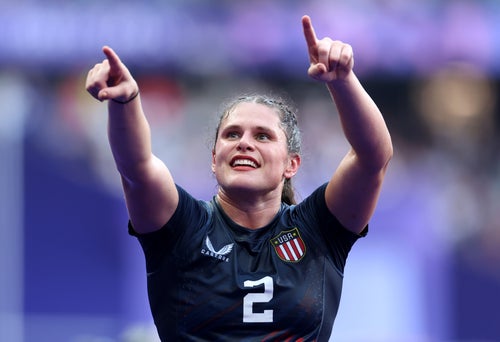 U.S. player Ilona Maher celebrates a win in the Women's Rugby Sevens bronze medal match Tuesday with Team Australia at the Paris Olympics.