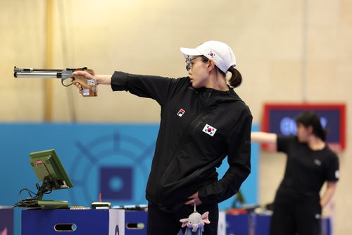 Kim Yeji of Team Republic of Korea shoots during the women's 10-meter air pistol final Sunday at the Paris Olympics.
