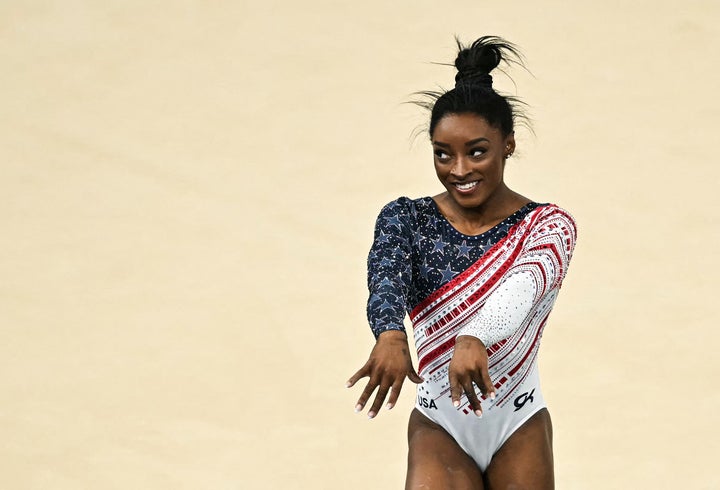 Simone Biles competes during the Paris Olympics. In 2021, Vance tried to explain why celebrating Biles' decision to withdraw from the Tokyo Olympics was a sign of our culture getting soft.