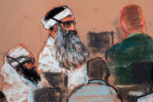 This Monday, Dec. 8, 2008 courtroom drawing by artist Janet Hamlin and reviewed by the U.S. military, shows Khalid Sheikh Mohammed, center, and co-defendant Walid Bin Attash, left, attending a pre-trial session at Guantanamo Bay Naval Base, Cuba.