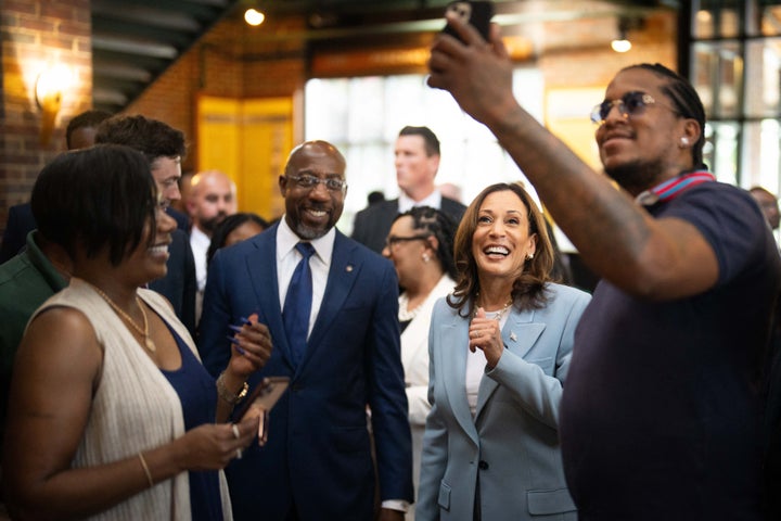 Vice President Kamala Harris, the likely Democratic presidential nominee, poses for a selfie Tuesday as she visits Paschal's, a historic Black-owned restaurant in Atlanta, before appearing at a campaign rally that night.