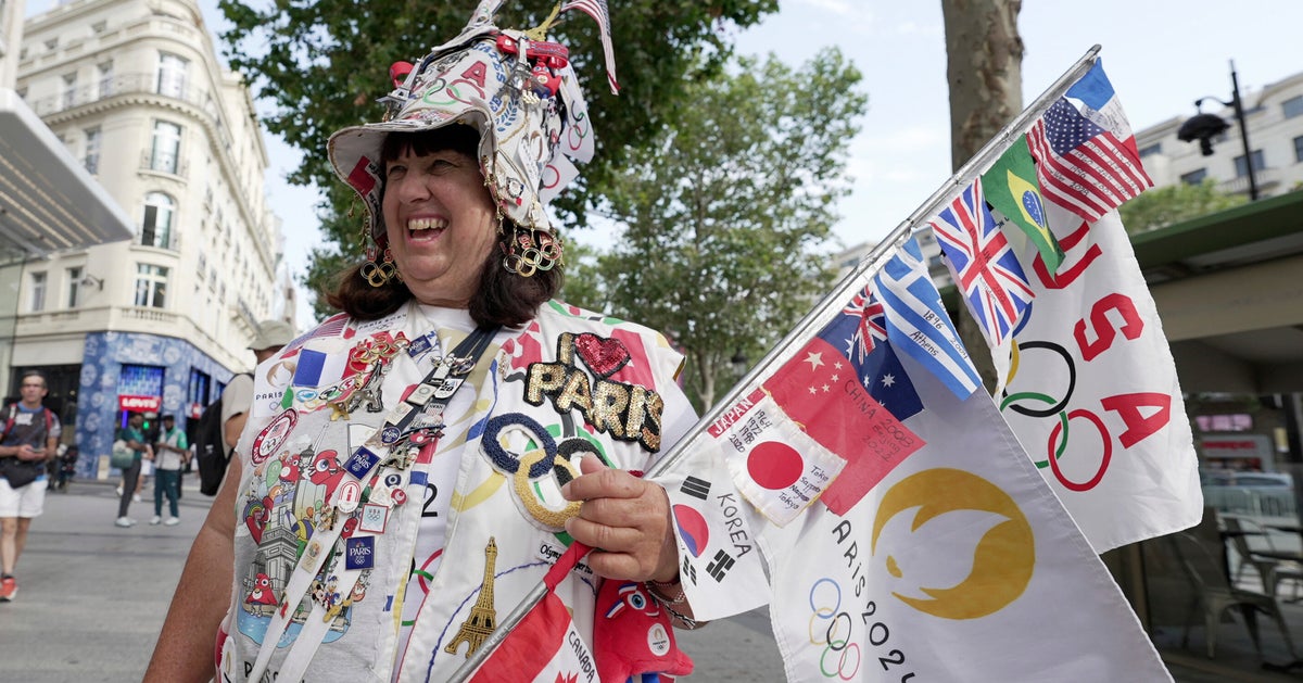 NextImg:Meet The Olympics Superfan Who Spent Her Savings Getting To 7th Games