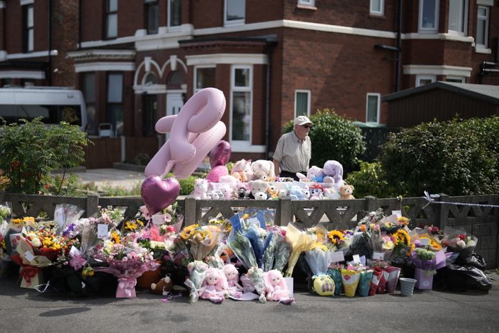 Tributes to the victims are left by wellwishers on July 30, 2024 in Southport, England.