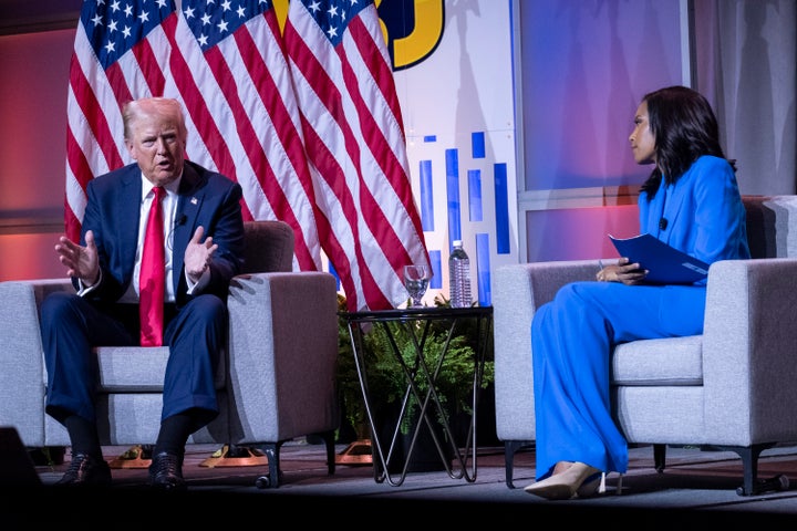 Republican presidential nominee Donald J. Trump and Rachel Scott, senior congressional correspondent for ABC News attend a Q&A on the opening day of the National Association of Black Journalists Annual Convention in Chicago on July 31, 2024.