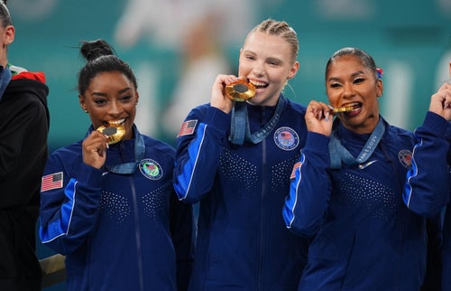 The way some U.S. gymnastics team members tell it, their team-event gold medals might taste better than the Olympic village food.