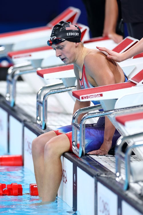 Ledecky takes a breather after competing in the 4x200 relay.