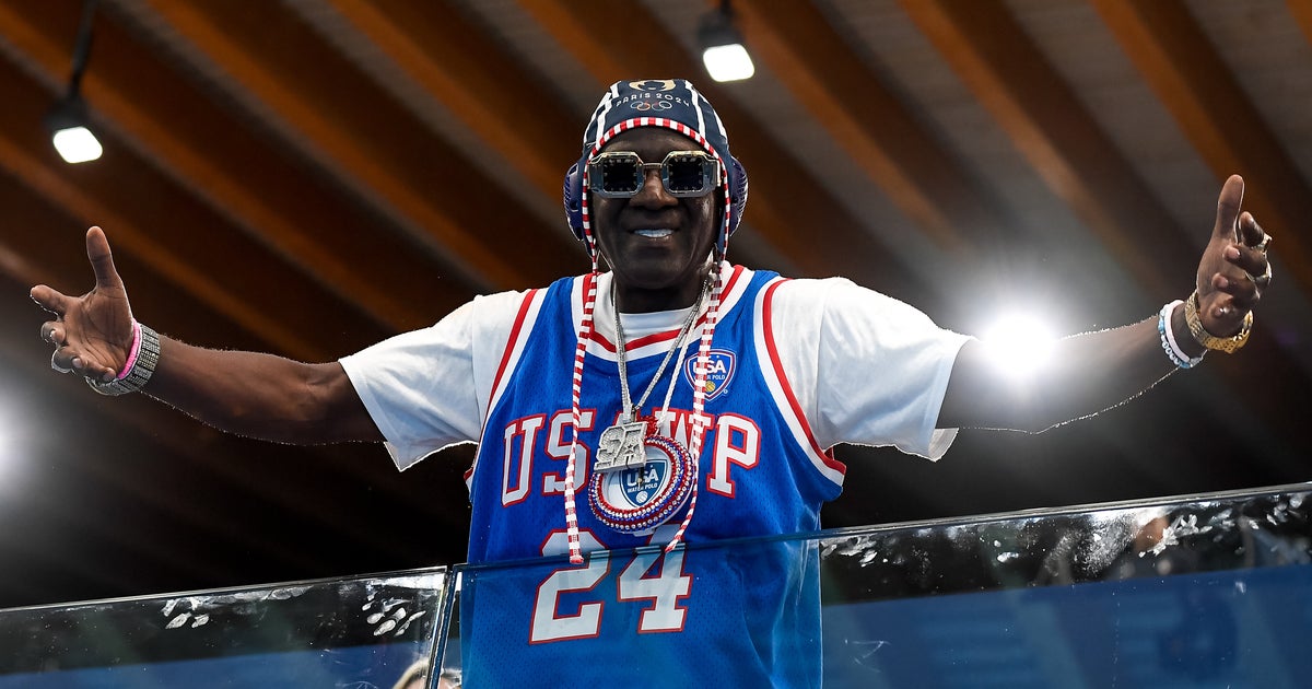 NextImg:'I Gotchu': Flavor Flav Steps In After Olympian's Viral Post About Paying Rent