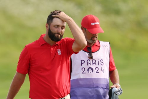 Jon Rahm of Spain reacts on the 18th green at the Paris Olympics.