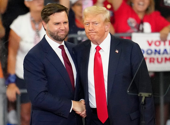 Vance and Trump at a campaign rally Saturday at Georgia State University in Atlanta. 